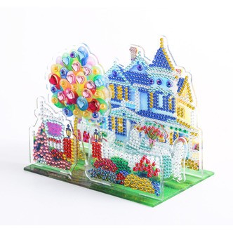 3D-billede af balloner foran hus