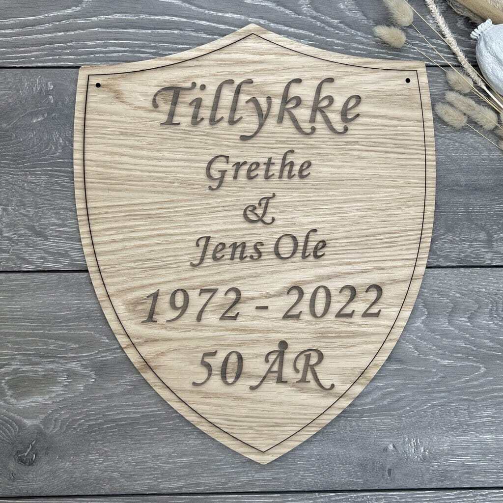 Æresport skjold med kant og kursiv tekst