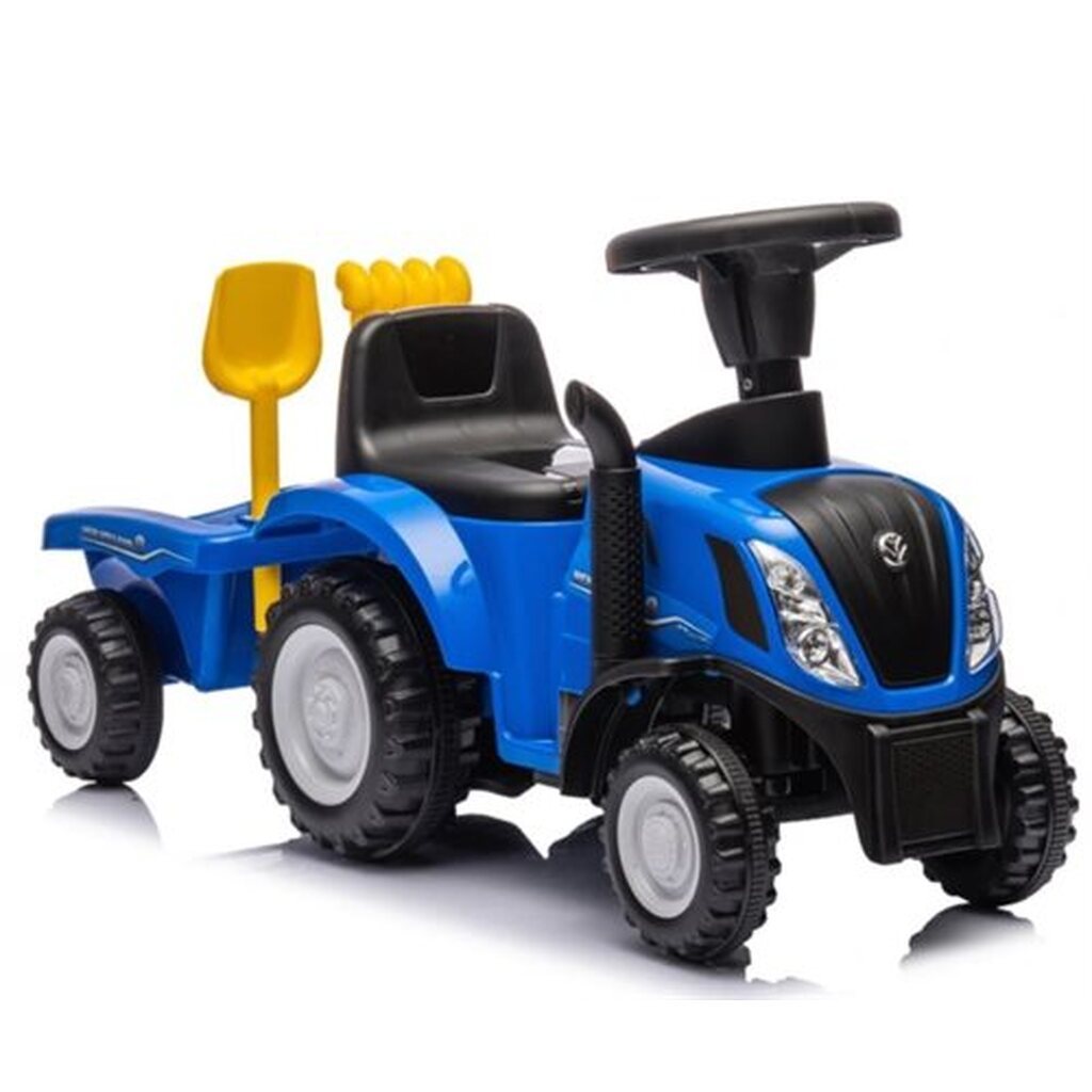 New Holland traktor med vogn, skovl og rive