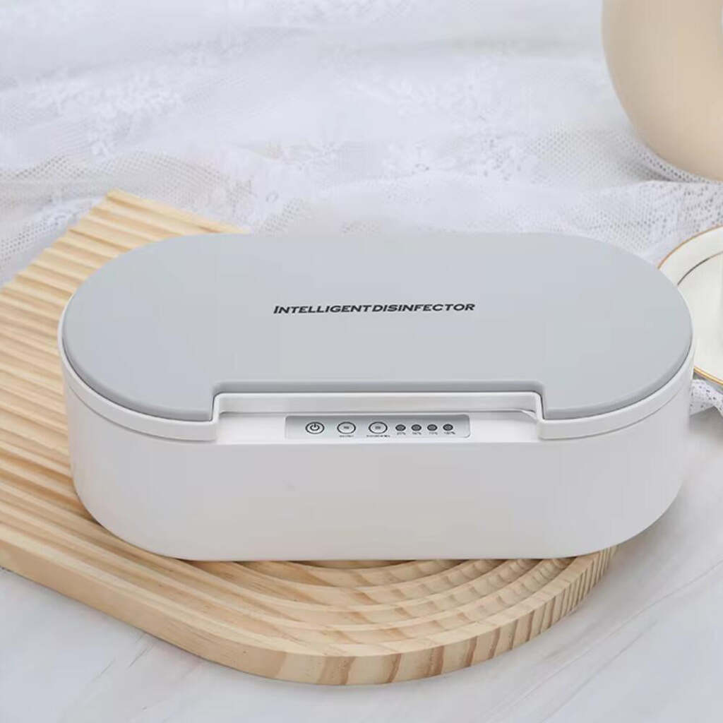 Smykke- og brillerenser med UV-C sterilisation og aromaterapi