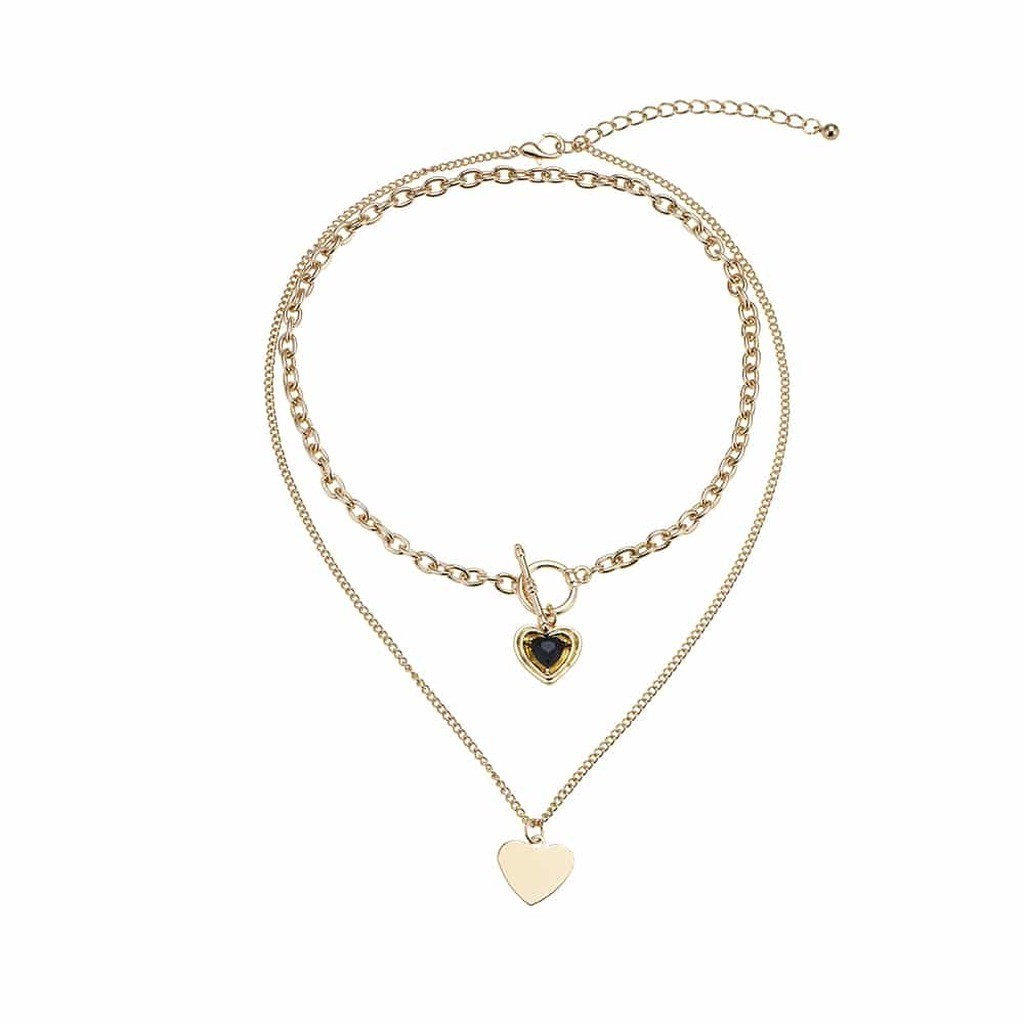 Halskæde guldfarvet, dobbelt, 2 små hjerter som vedhæng