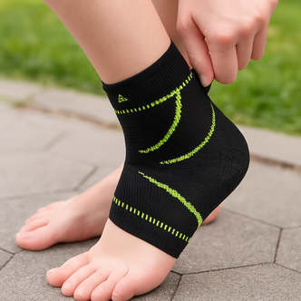 Ankelstøtte med kompression