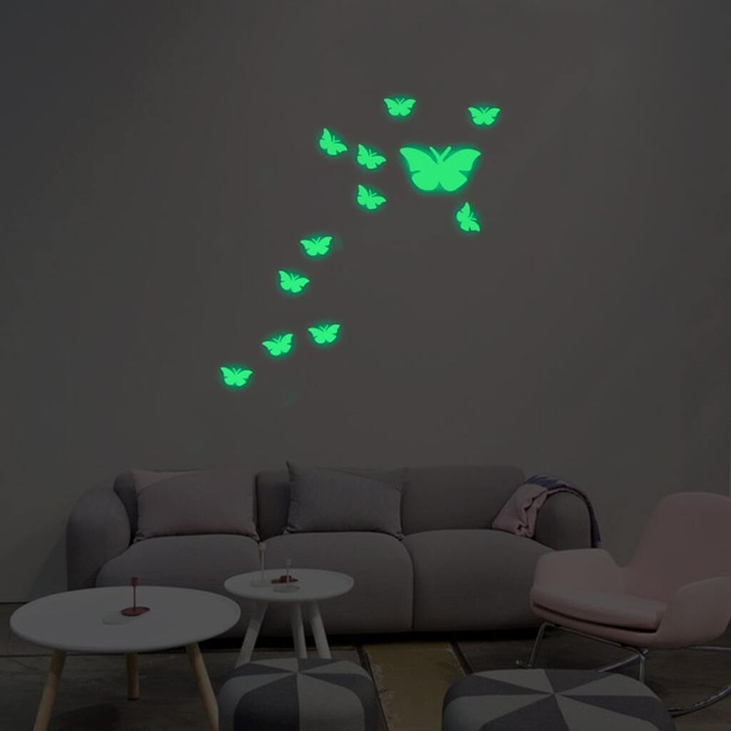 Selvlysende sommerfugle wallsticker. 1 stor, 12 små - 13 stk i alt.